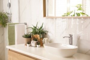 stylish-bathroom-interior-with-countertop-mirror-and-houseplants-design-idea-400-193377925